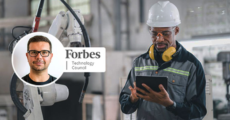 warehouse worker looking at handheld screen, Fabio Belloni Forbes tech council logo