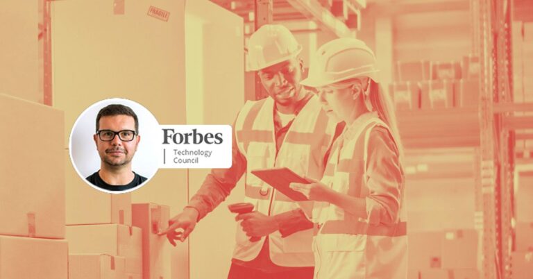 Two warehouse workers looking at handheld screen, Fabio Belloni Forbes tech council logo